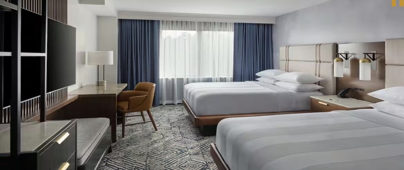 Marriott RTP guestroom with double queen beds and patterned carpet