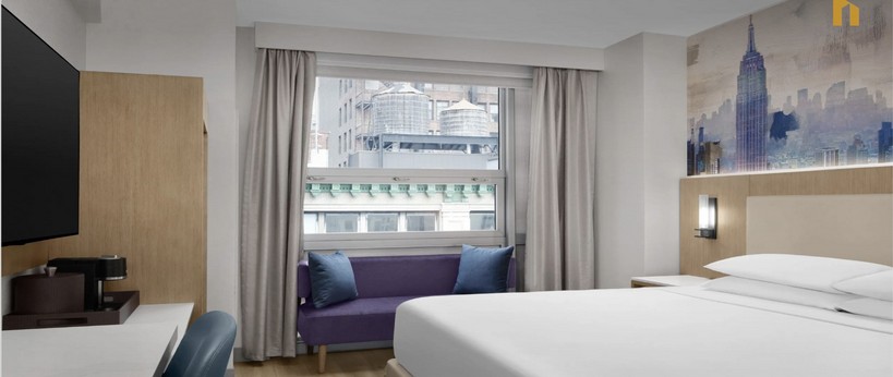 Hyatt Herald Square guestroom with city skyline view
